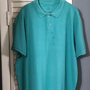 American Eagle Outfitters Turquoise Cotton Polo Sz XL. Small stain on the front.